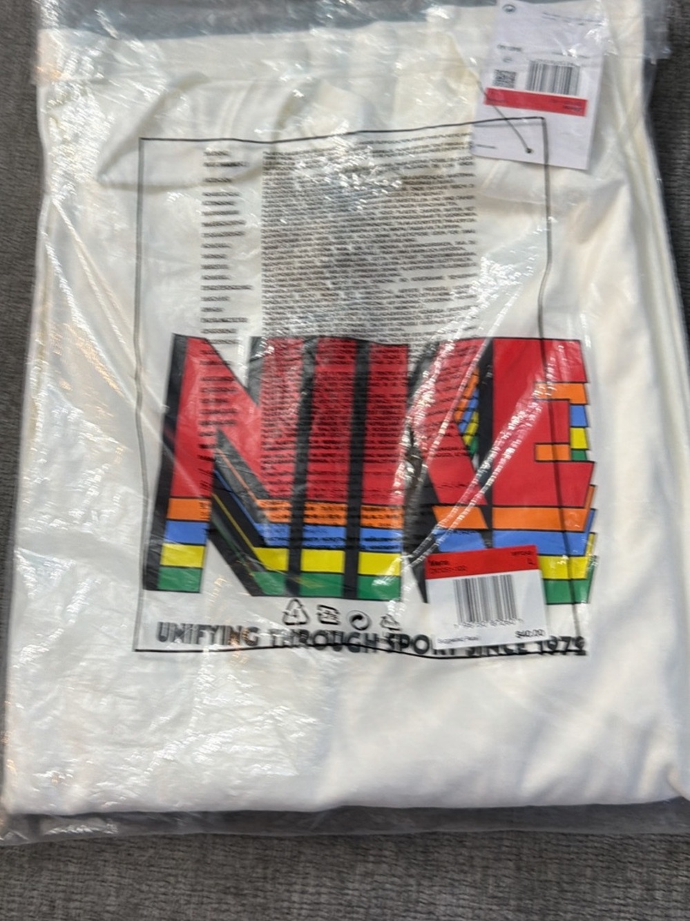 Nike White Short Sleeve T-Shirt with Rainbow Block NIKE Logo